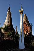 Inle Lake Myanmar. Indein, a cluster of ancient stupas  ruined and overgrown with bushes, just behind the village.